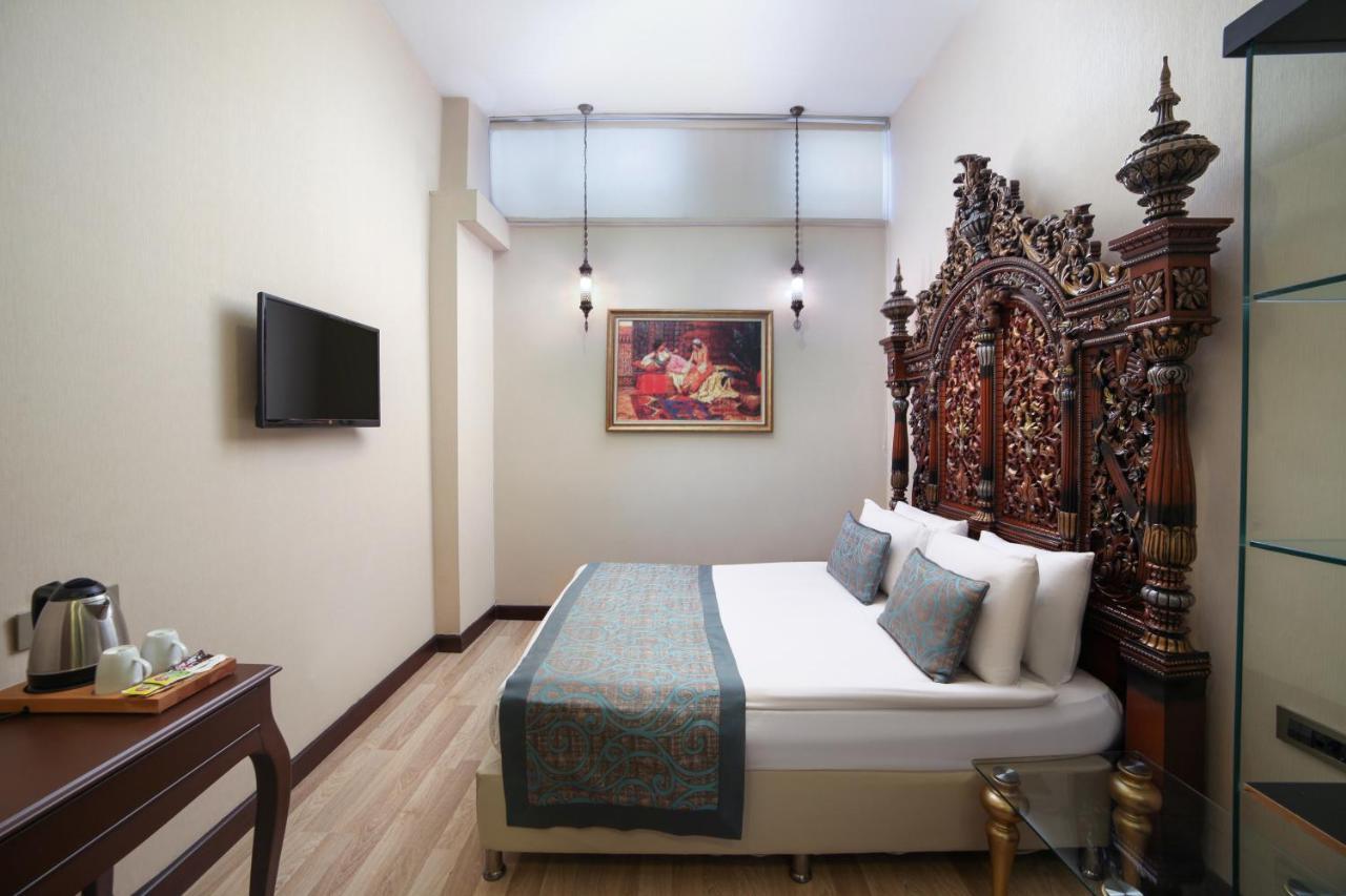 Great Fortune Hotel & Spa Стамбул Экстерьер фото A room at the hotel